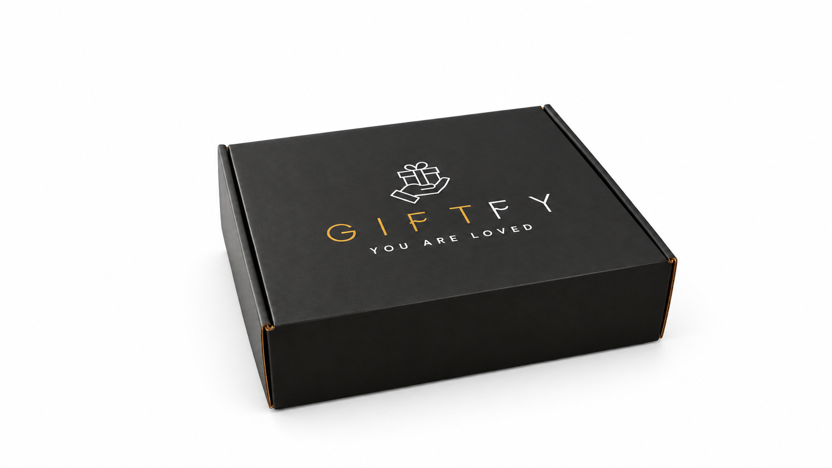 The closed black GIFTFY box, with its gold and white logo, on a seamless white studio background